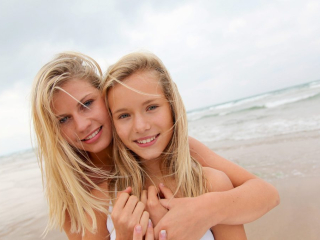 Mother with daughter on the beach Ringwood Family Photography