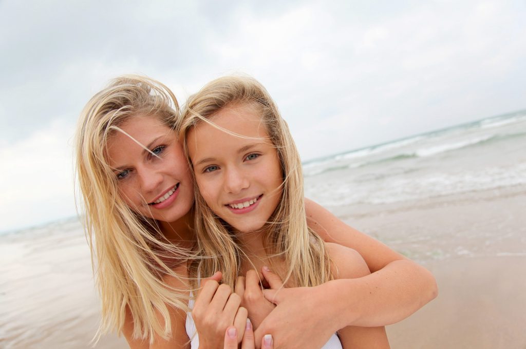 Mother with daughter on the beach Ringwood Family Photography
